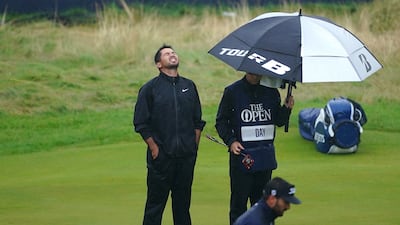 Australia's Jason Day reacts after missing a birdie on the 18th green. PA