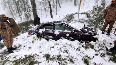 Soldiers take part in a mission to rescue people who became trapped in their cars during heavy snowfall in Murree, Pakistan. EPA