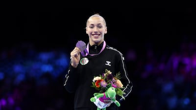 Kaylia Nemour with her uneven bars silver medal at the 2023 Artistic Gymnastics World Championships. Getty