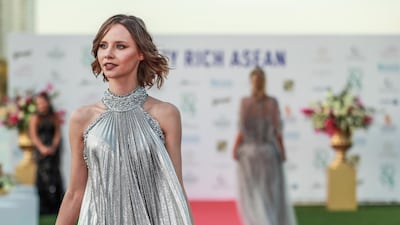 Fashion by Filipino designers Jose and Aldwin Guardiana.