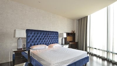 One of the bedrooms in the three-bedroom apartment in the Burj Khalifa. Courtesy Better Homes