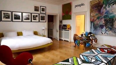 A red Marc Newson chair and the soft-toy Banquete Chair by Fernando and Humberto Campana are among the artistic treasures in a bedroom. Graham Atkins-Hughes / Gap Interiors