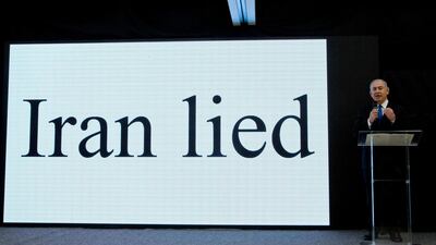 Israeli Prime Minister Benjamin Netanyahu presents material in April last year on what he described as a secret Iranian nuclear weapons development. AP