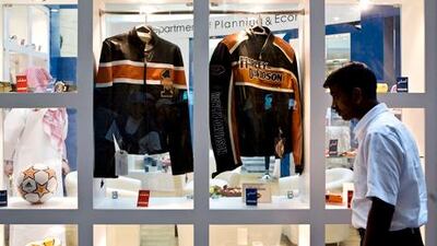 The Anti- Commercial Counterfeiting Exhibition organized by the Department of Planning & Economy at Abu Dhabi Mall displays counterfeit (left) and genuine Harley Davidson jackets side by side. Philip Cheung / The National