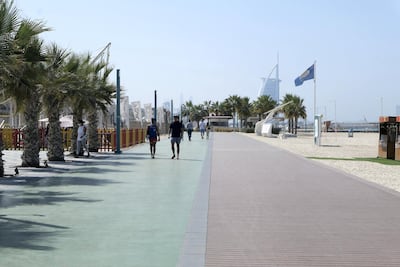 The popular jogging track runs along the beach from Umm Suqeim Park, all the way up past the Water Canal, into Jumeirah. Pawan Singh / The National