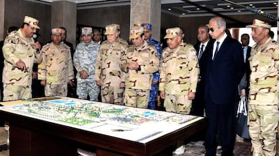 President Abdel-Fattah El Sissi attends the inauguration of the East Suez Canal Counter-Terrorism command, in Sinai, Egypt. MENA / via AP