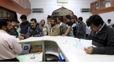 Parents fill out admission forms for their children at Indian Islahi Islamic school on Muroor Road in Abu Dhabi.