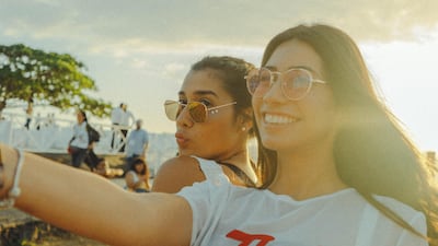 Popularity was once measured by how many friends you had in school – now it is benchmarked against the number of strangers vicariously consuming your content. Unsplash / Gian Cescon