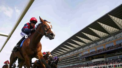 Graham Lee rides Trip To Paris to the win at the Gold Cup on Ladies Day at Royal Ascot, giving trainer Ed Dunlop the trophy his father, John, won in 1974 . Eddie Keogh / Reuters