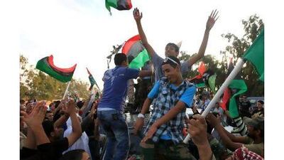 Libyan fighters returning from Sirte are welcomed at Al Guwarsha gate in Benghazi on Saturday. A letter writer warns that while the war may be over, much hard work lies ahead for Libyans. Esam Al-Fetori / Reuters