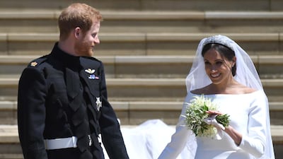 Prince Harry and Meghan, Duchess of Sussex, exit St George's Chapel after their wedding ceremony on May 19, 2018. EPA