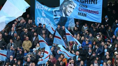 Manchester City fans display a banner of manager Manuel Pellegrini during a Premier League match against Hull City at the Etihad Stadium on February 7, 2015 in Manchester, England. (Photo by Alex Livesey/Getty Images)