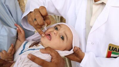 Millions of children have received vaccines, including against polio, pictured, in the schemes run by the UAE. Credit / WAM