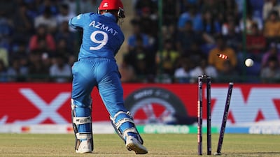 Afghanistan's Azmatullah Omarzai is bowled out by India's Hardik Pandya. Reuters