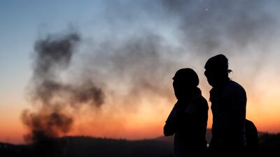 Smoke rises as protests continue in the Israeli-occupied West Bank.