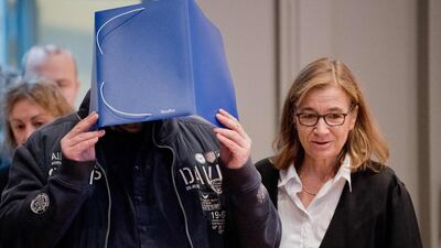 Former nurse Niels Hoegel, accused of killing more than 200 patients in his care, arrives with his lawyer Ulrike Baumann, in court. AFP