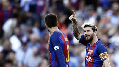 Barcelona’s Lionel Messi celebrates after scoring against Deportivo Coruna at the Camp Nou in Barcelona, Spain. Manu Fernandez / AP Photo