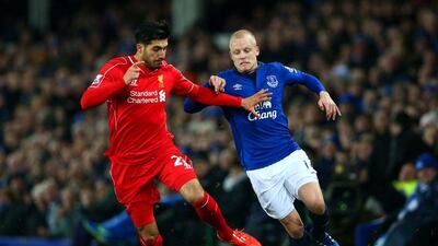 Emre Can of Liverpool battles for the ball with Steven Naismith of Everton during their Premier League match on Saturday. Clive Brunskill / Getty Images / February 7, 2015