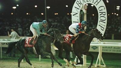Jerry Bailey, right, riding Cigar, wins the first Dubai World Cup in 1996 at Nad Al Sheba racecourse. Phil Cole / Allsport / March 27, 1996