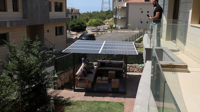 Mohammad Chehab, of the coastal town of Khaldeh, has installed a solar panel in his house to ensure uninterrupted electricity. Reuters