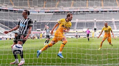 Harry Kane begins his celebations after scoring his first goal against Newcastle. EPA