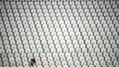 Portugal's forward Cristiano Ronaldo is seen against the back drop of an empty standium during a Euro 2016 training session at the Geoffroy-Guichard stadium in St Etienne on June 13, 2016 on the eve of their opening match against Portugal. Odd Andersen / AFP