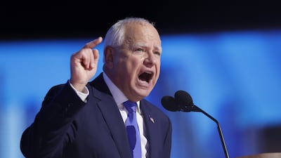 Mr Walz, the Democratic vice presidential nominee, speaks during the third night of the DNC. EPA