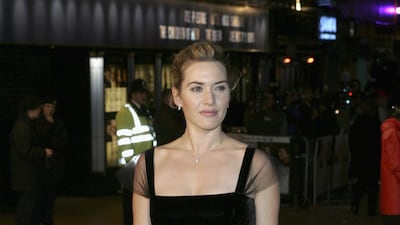 Kate Winslet, in a full-skirted black dress, attends the premiere of 'The Holiday' at Odeon Leicester Square on December 5, 2006, in London, England. Getty Images