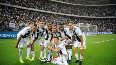 Juventus players celebrate their success over AC Milan. Getty