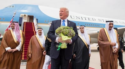 US President Donald Trump is welcomed by King Salman at King Khalid International Airport in Riyadh, Saudi Arabia, in May 2017. Saudi Press Agency / EPA