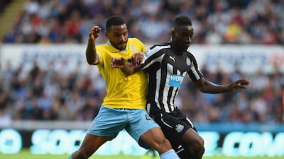 Jason Puncheon, left, of Crystal Palace battles with Massadio Haidara of Newcastle United during their Premier League match at St James' Park on August 30, 2014, in Newcastle upon Tyne, England. Nigel Roddis / Getty Images
