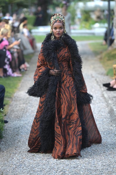 Halima Aden wore a voluminous kaftan with a matching head wrap. Courtesy Dolce & Gabbana