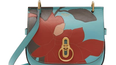Mulberry: Patched leather leaves become a striking motif when set against a soft teal background.