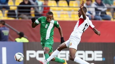 Mali’s Abdoul Dante and Nigeria’s Victor Osimhen vie for a header on Sunday during the 2015 U17 World Cup final. Marcelo Hernandez / AFP