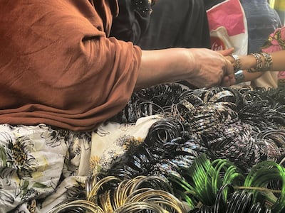 Other Jogi women provide fortune-telling services. Hikmat Noori for The National