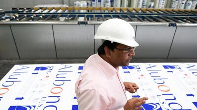 Shaji Ul Mulk, the chairman of the company that makes Alubond panels, says they do not make non-combustible panels in the UAE because of a lack of local demand. Pawan Singh / The National