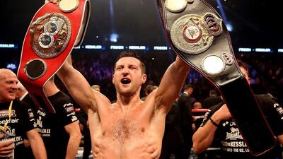 Carl Froch celebrates his victory over Mikkel Kessler during their Super Middleweight Unification bout at the O2 Arena on May 25, 2013 in London, England. Scott Heavey / Getty Images
