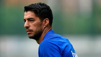 Barcelona's Uruguayan forward Luis Suarez takes part in a pre-season training session at the Joan Gamper training ground. AFP
