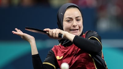 Dina Meshref returns a shot to Hina Hayata. The Egyptian suffered a 4-0 defeat to her Japanese opponent. EPA