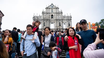 Tourists visit the Ruins of St. Paul's during the Chinese Lunar New Year holiday also known as Spring Festival, in Macau, China. Macau climbed the ranks to become the third most popular city for travelers in 2019. Reuters