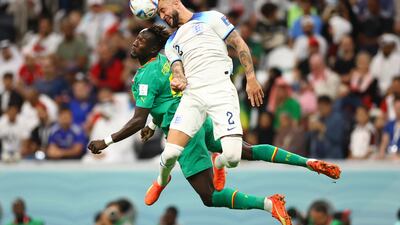 Senegal's Famara Diedhiou in action with England's Kyle Walker. Reuters