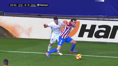 Above, football action from a La Liga game showing the same shot but with a different advertising. Courtesy Mediapro