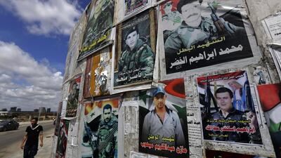 Many shops in the city of 90,000 display large posters proclaiming the “Glory of the Unknown Soldier”. Joseph Eid/AFP Photo