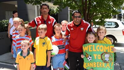 UAE football coaches pose for a photo with Australian youths welcoming them to Canberra ahead of the 2015 Asian Cup.