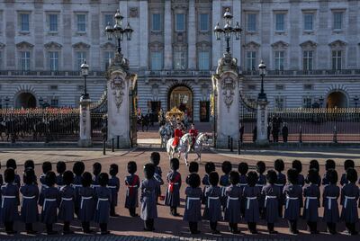 The King's Guard lined up outside Buckingham Palace as King Charles III and Queen Camilla depart. Getty Images