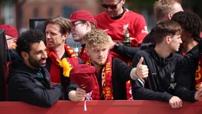 Liverpool's Harvey Elliott and Mohamed Salah during the trophy parade. Reuters