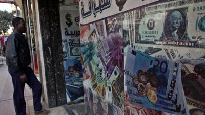 Egyptian debt instruments attracted $15 billion from foreign investors since November. Khalil Hamra / AP Photo