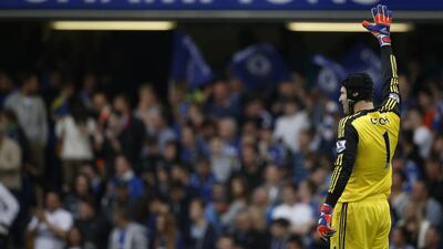 Chelsea keeper Petr Cech raises his arm after a goal for his team on Sunday in their Premier League victory over Sunderland. Adrian Dennis / AFP