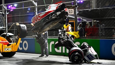 Mick Schumacher's car is removed from the Jeddah Corniche Circuit. Getty
