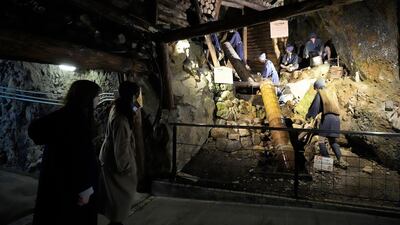 Visitors look at a display at the Sado Gold Mines in Niigata prefecture, Japan, which were listed as a Unesco World Heritage site in July. AP Photo